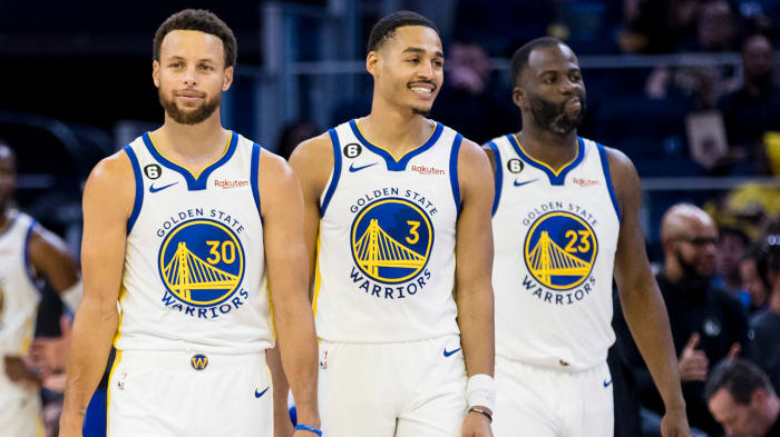 Stephen Curry, Jordan Poole and Draymond Green